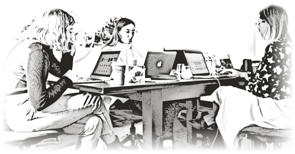 A Socavi engineer working with a client's team at their table
