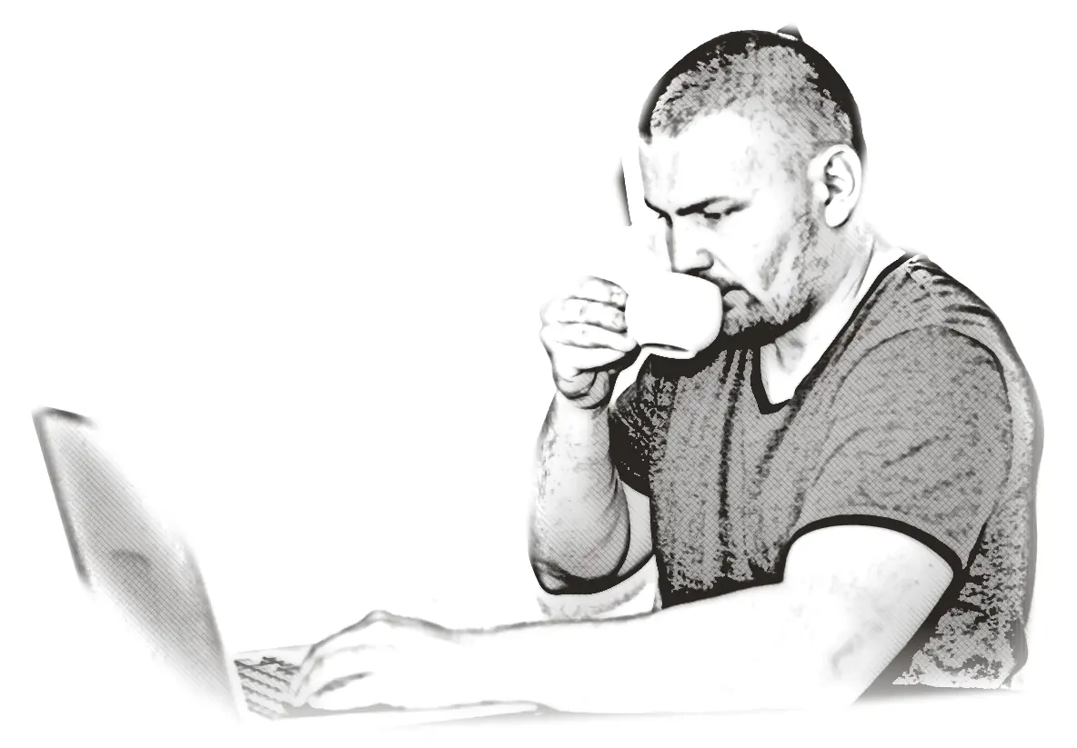 A buyer reading his email over coffee