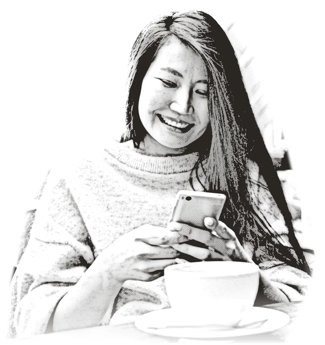 A woman reading replies on her phone in a café